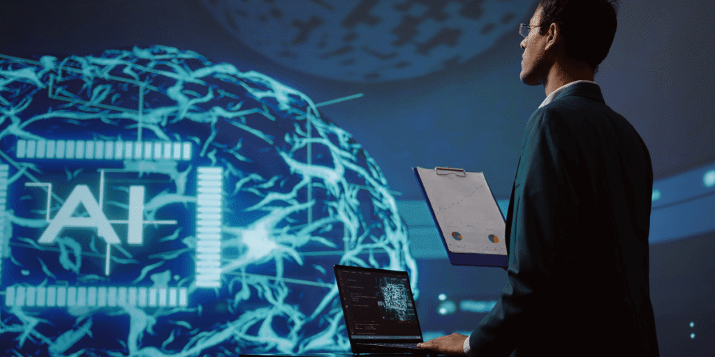 A man in a suit stands before a computer screen displaying an AI logo, suggesting a professional tech environment.
