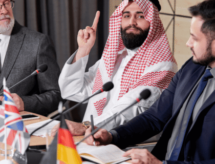 Saudi Arabia's foreign minister and Russia's foreign minister engage in a diplomatic meeting.